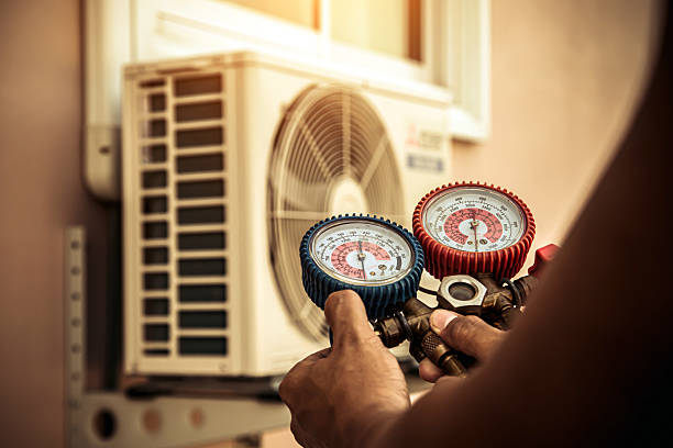 Professional Heat Pump Repair technician working in Lavon, TX
